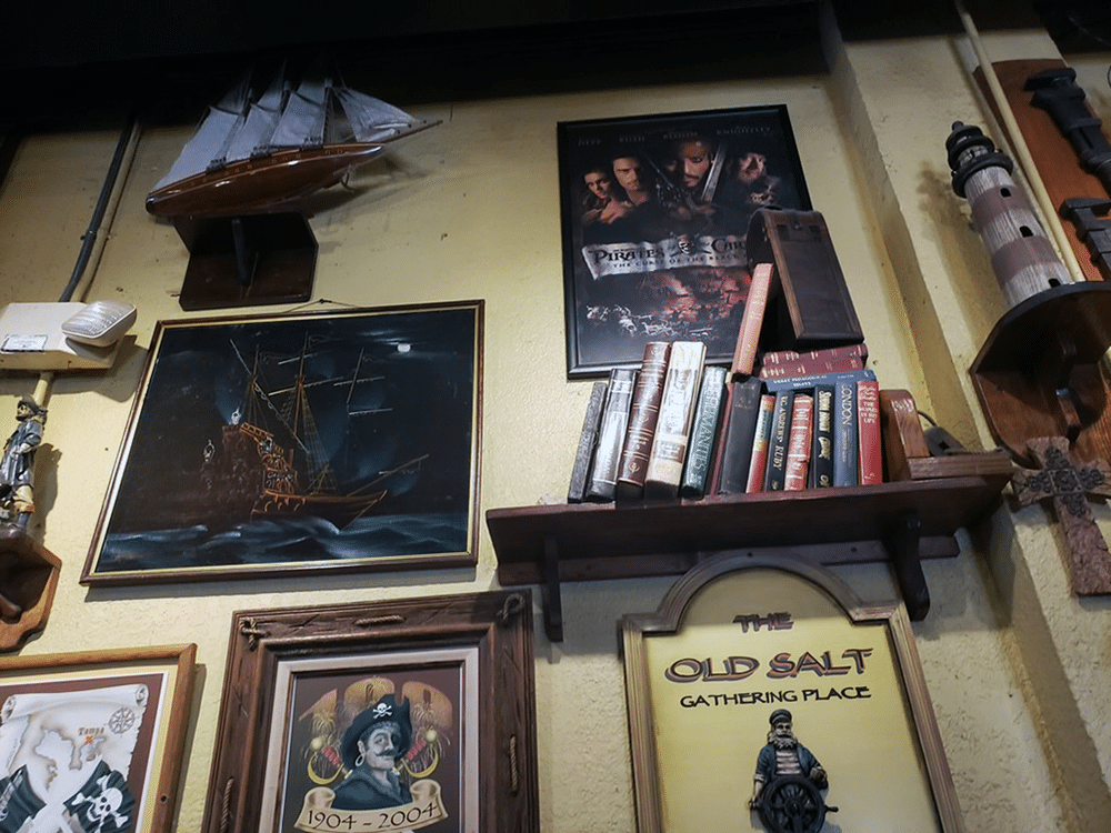 Artifacts & Artwork on the Wall at Gaspar's Grotto in Tampa, FL