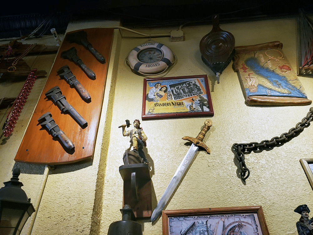 Artifacts & Artwork on the Wall at Gaspar's Grotto in Tampa, FL